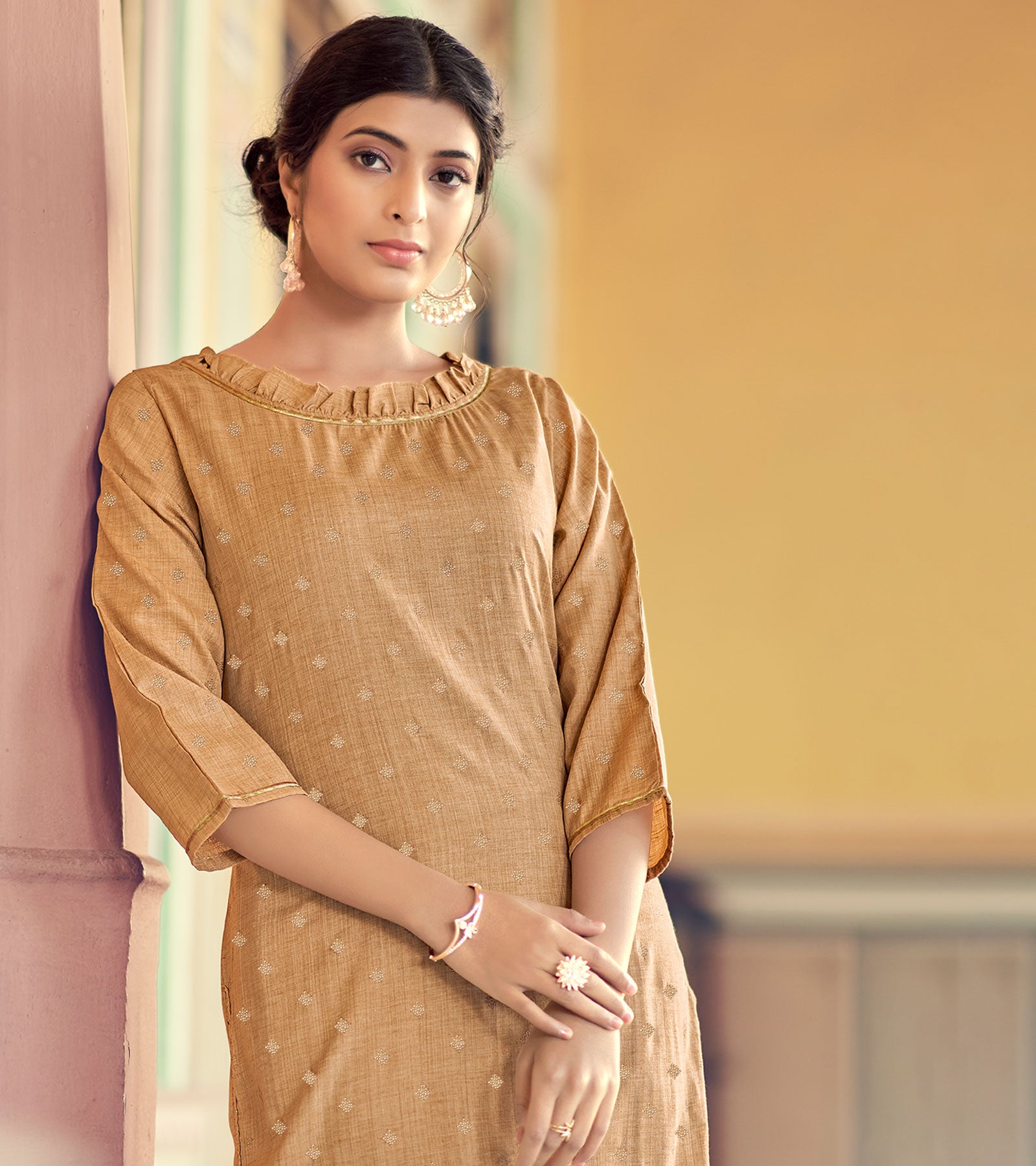 Golden Printed Rayon Kurti: Stylish Three Quarter Sleeves with Lace  Detailing